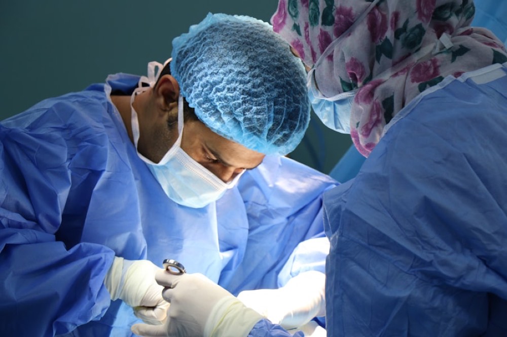 A surgeon and clinical team at work in the operating room